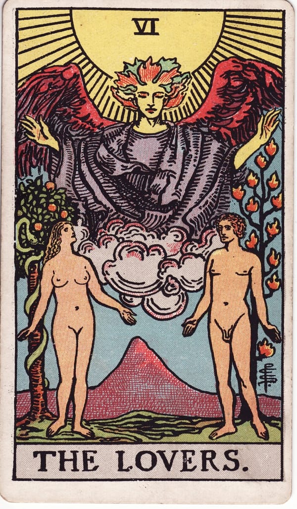 The Lovers tarot card: A naked man and woman stand in a garden beneath a great angel — Raphael — whose blessing pours down like sunlight.
